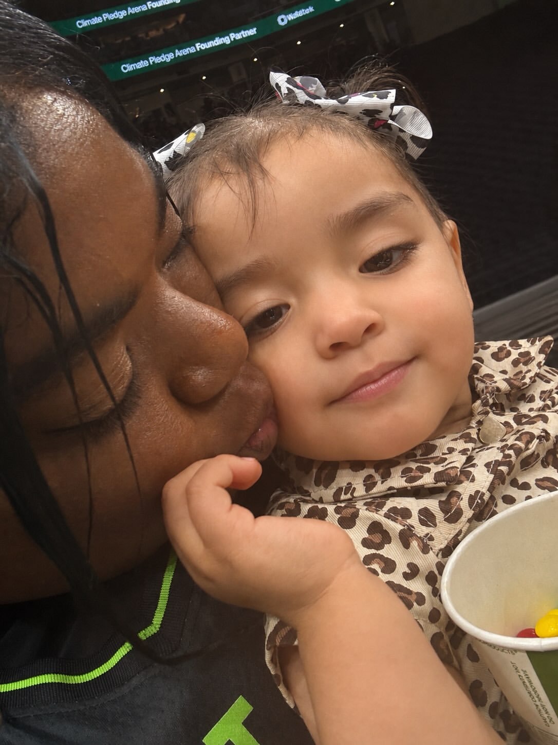 Kinship caregiver and child sharing a tender moment